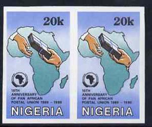Nigeria 1990 Pan African Postal Union 20k (Map & Parcel) unmounted mint imperf pair as SG 587, stamps on postal, stamps on maps, stamps on 