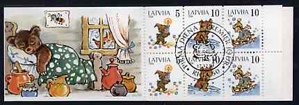 Booklet - Latvia 1994 Margarita Staraste (Childrens Writer) 50s booklet complete with first day cancels, stamps on children     writers    literature    candle    bear    bobsled     honey, stamps on bees, stamps on insects