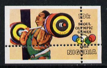 Nigeria 1988 Seoul Olympic Games 10k (weightlifting) with spectacular misplaced perfs error (divided along margins so stamp is quartered) unmounted mint as SG 565, stamps on , stamps on  stamps on sport  varieties    olympics     weightlifting