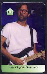 Telephone Card - Eric Clapton £10 phone card showing EC playing guitar at mike, stamps on pops, stamps on entertainments, stamps on music, stamps on guitar, stamps on musical instruments