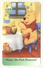 Telephone Card - Winnie the Pooh £10 'phone card #01 showing Pooh seated at table eating Hunny, stamps on bears, stamps on honey, stamps on bees, stamps on children, stamps on literature, stamps on insects