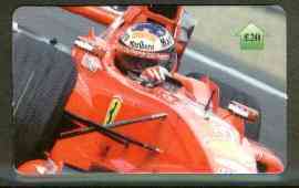 Telephone Card - Michael Schumacher £20 phone card (showing MS in Ferrari viewed from front), stamps on cars    racing cars      ferrari, stamps on shells