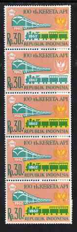Indonesia 1968 Railway Centenary 30r vert strip of 5, yellow completely omitted from one stamp and partially omitted from another, unmounted mint SG 1194var, stamps on railways