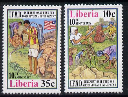 Liberia 1986 Agricultural Development Fund set of 2 unmounted mint, SG 1706-07, stamps on farming, stamps on flags, stamps on swine, stamps on chickens