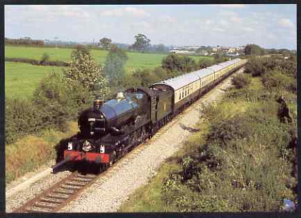 Postcard produced in 1980's in full colour showing GWR Collet King Class 4-6-0 Prototype King George V, unused and pristine, stamps on railways