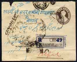 India 1936 1a p/stat env bearing additional 4a registered from Gorakhpur to Nepal, with various cancels, stamps on 
