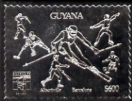 Guyana 1992 'Genova 92' International Thematic Stamp Exhibition $600 perf embossed in silver foil featuring Albertville & Barcelona Olympics and showing Fencing, Ice Hockey, Skiing, Baseball, Football & Ice Skating (Dancing), stamps on stamp-exhibitions, stamps on olympics, stamps on fencing, stamps on  ice hockey, stamps on  skiing, stamps on  baseball, stamps on football, stamps on ice skating, stamps on dancing