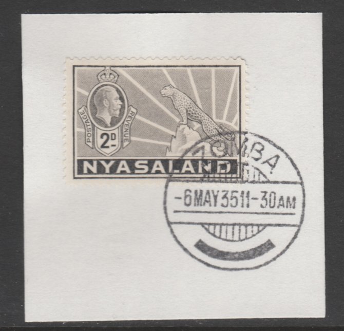 Nyasaland 1934-35 KG5 Leopard Symbol 2d pale grey SG 117 on piece with full strike of Madame Joseph forged postmark type 314, stamps on , stamps on  kg5 , stamps on arms, stamps on leopard, stamps on cats
