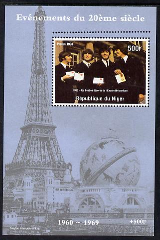 Niger Republic 1998 Events of the 20th Century 1960-1969 The Beatles receive MBE perf souvenir sheet with additional row of perforations at top unmounted mint, stamps on millennium, stamps on eiffel tower, stamps on personalities, stamps on medals, stamps on beatles, stamps on pops, stamps on music, stamps on rock