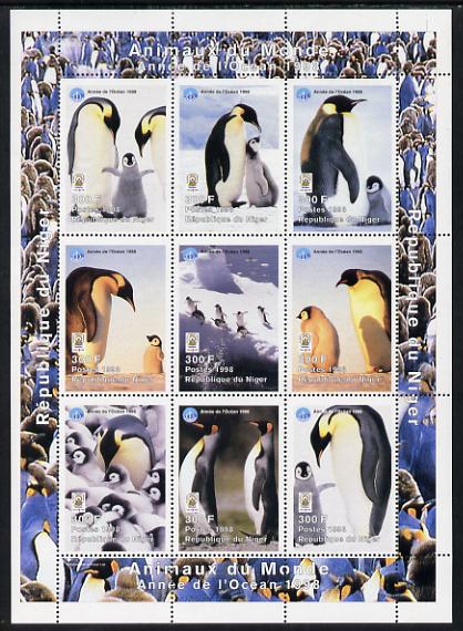 Niger Republic 1998 Animals of the World #5 (Penguins) perf sheetlet containing 9 x 300f values each with Year of the Ocean logo unmounted mint. Note this item is privately produced and is offered purely on its thematic appeal Scott #1010, stamps on animals, stamps on birds, stamps on penguins, stamps on polar, stamps on oceans