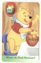 Telephone Card - Winnie the Pooh 10 'phone card #05 showing Pooh standing at table eating Hunny, stamps on bears, stamps on honey, stamps on bees, stamps on children, stamps on insects, stamps on literature