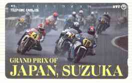 Telephone Card - Japan 105 units phone card showing Riders entering Left Hand Bend inscribed Grand Prix of Japan, Suzuka (card number 290-475), stamps on motorbikes