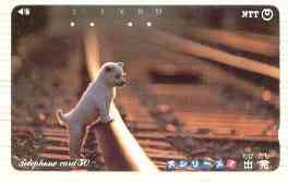 Telephone Card - Japan 50 units phone card showing Dog on Railway Line (card number 290-346), stamps on dogs