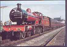 Postcard produced in 1980s in full colour showing Midland Railway East Midlander Compound Class 4P 4-4-0, unused and pristine, stamps on railways