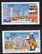 Germany - East 1979 Berlin Project - Free German Youth Organisation perf set of 2 unmounted mint, SG E2134-35, stamps on , stamps on  stamps on youth, stamps on  stamps on buildings, stamps on  stamps on cranes, stamps on  stamps on surveying