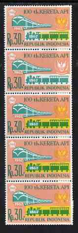 Indonesia 1968 Railway Centenary 30r vert strip of 5, yellow completely omitted from one stamp and partially omitted from another, unmounted mint SG 1194var, stamps on , stamps on  stamps on railways