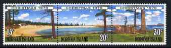 Norfolk Island 1979 Christmas se-tenant strip of three forming a composite design of island scenes unmounted mint, SG 230-32, stamps on , stamps on  stamps on christmas, stamps on  stamps on trees