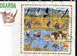 Uganda 1989 Wildlife at Waterhole composite perf sheet containing set of 20 values on cover with first day cancels, SG 715a, stamps on animals, stamps on birds, stamps on storks, stamps on pelicans, stamps on vultures, stamps on birds of prey, stamps on elephants, stamps on giraffes, stamps on herons, stamps on rhino, stamps on sebra, stamps on eagle, stamps on hippos, stamps on buffalo, stamps on baboon, stamps on apes, stamps on flamingoes, stamps on cranes