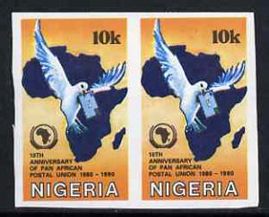 Nigeria 1990 Pan African Postal Union 10k (Map & Dove) unmounted mint imperf pair as SG 586, stamps on , stamps on  stamps on postal, stamps on  stamps on maps, stamps on  stamps on doves