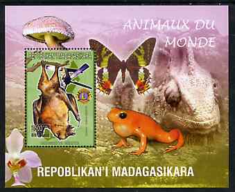 Madagascar 1999 Animals of the World #17 perf m/sheet showing Rousette Bat with Lions Int Logo, background shows Frog, Butterfly, Reptile, Fungi & Orchid, unmounted mint, stamps on , stamps on  stamps on flowers, stamps on  stamps on orchids, stamps on  stamps on animals, stamps on  stamps on reptiles, stamps on  stamps on fungi, stamps on  stamps on butterflies, stamps on  stamps on lions int