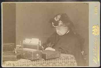 Great Britain 1880c cabinet size photograph of QUEEN VICTORIA at her dispatch boxes mounted on board, by Hills & Saunders of Eton.  The Queen is wearing bonnet and cloak seated at a table, probably taken while she worked in her pavillion at Windsor., stamps on , stamps on  stamps on royalty