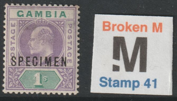 011 - GAMBIA 1902 KE7 1s optd SPECIMEN with BROKEN M variety large hinge remainder but only 13 can exist. Formerly in the John Rose Collection, stamps on 