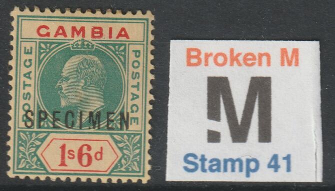 GAMBIA 1902 KE7 1s6d optd SPECIMEN with BROKEN M variety toned but only 13 can exist. Formerly in the John Rose Collection, stamps on 