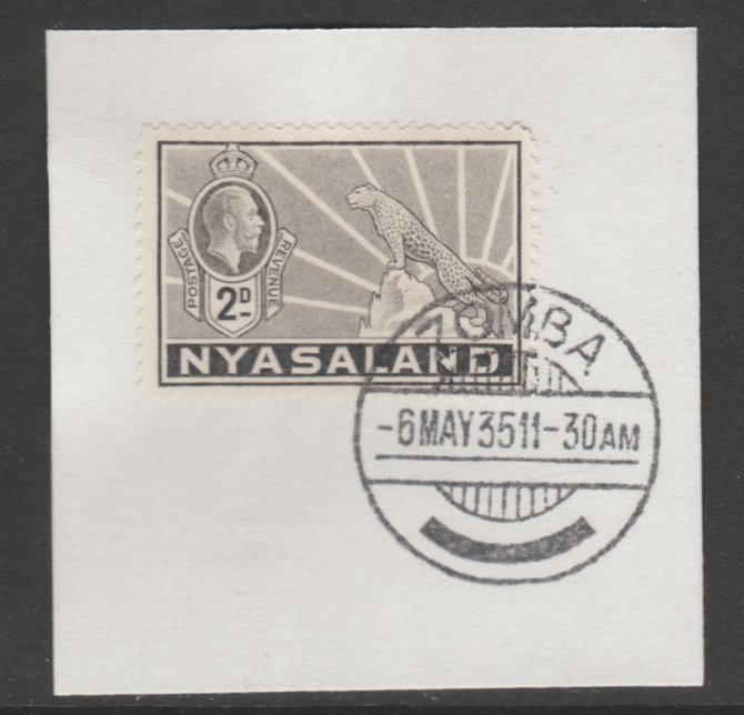 Nyasaland 1934-35 KG5 Leopard Symbol 2d pale grey SG 117 on piece with full strike of Madame Joseph forged postmark type 314, stamps on , stamps on  stamps on , stamps on  stamps on  kg5 , stamps on  stamps on arms, stamps on  stamps on leopard, stamps on  stamps on cats