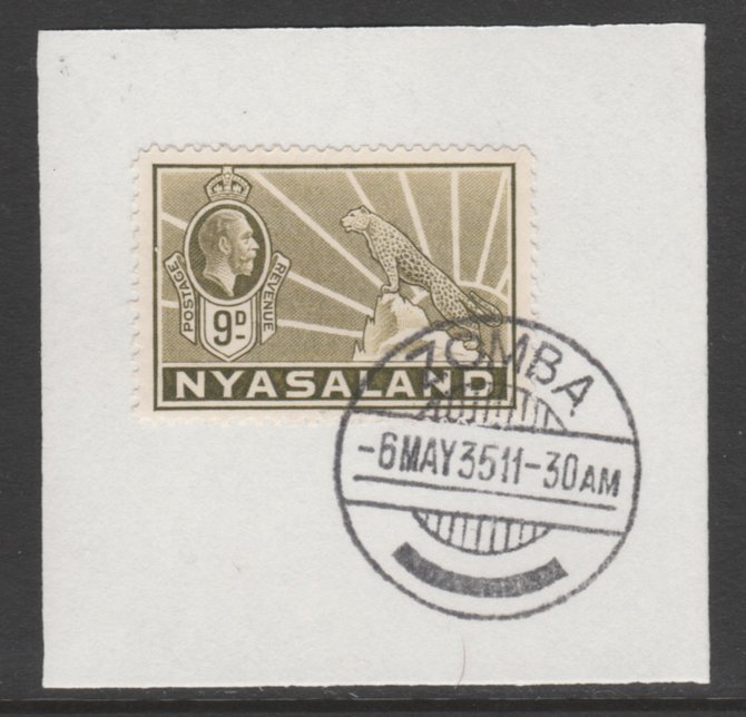 Nyasaland 1934-35 KG5 Leopard Symbol 9d olive bistre SG 121 on piece with full strike of Madame Joseph forged postmark type 314