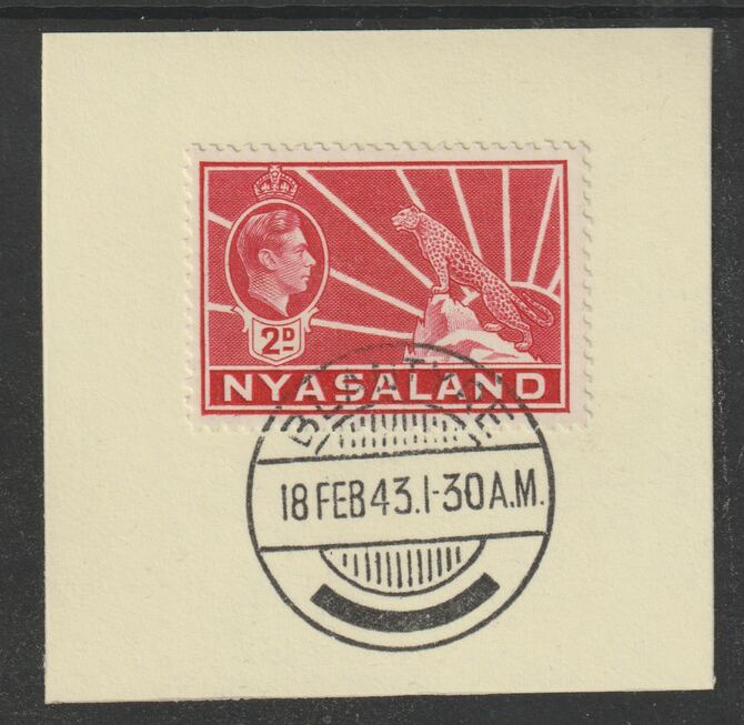 Nyasaland 1938-44 KG6 Leopard Symbol 2d carmine SG 133a on piece with full strike of Madame Joseph forged postmark type 317, stamps on , stamps on  stamps on leopard, stamps on  stamps on  kg6 , stamps on  stamps on forgeries