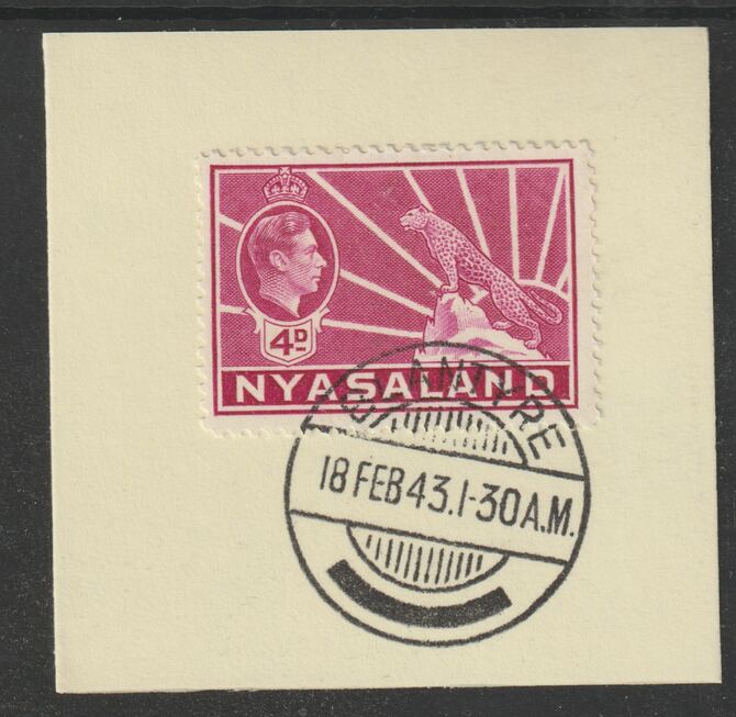 Nyasaland 1938-44 KG6 Leopard Symbol 4d magenta SG 135 on piece with full strike of Madame Joseph forged postmark type 317, stamps on leopard, stamps on  kg6 , stamps on forgeries
