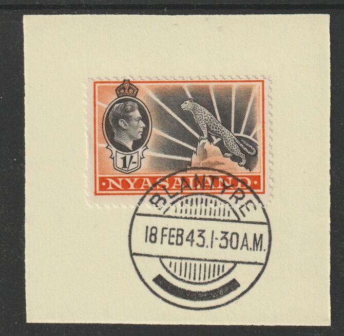 Nyasaland 1938-44 KG6 Leopard Symbol 1s black & orange SG 138 on piece with full strike of Madame Joseph forged postmark type 317, stamps on , stamps on  stamps on leopard, stamps on  stamps on  kg6 , stamps on  stamps on forgeries