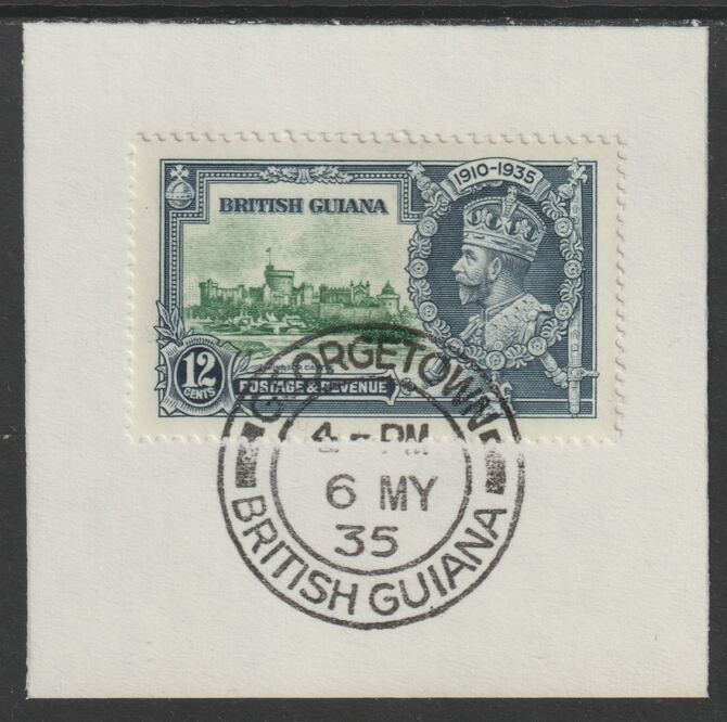 British Guiana 1935 KG5 Silver Jubilee 12c (SG 303) on piece with full strike of Madame Joseph forged postmark type 69 (First day of issue), stamps on , stamps on  kg5 , stamps on silver jubilee, stamps on castles
