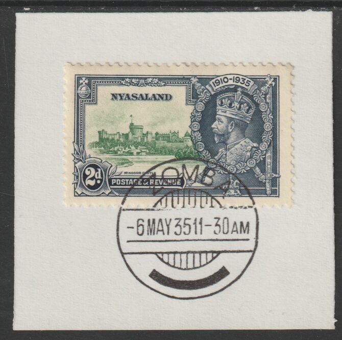 Nyasaland 1935 KG5 Silver Jubilee 2d (SG 124) on piece with full strike of Madame Joseph forged postmark type 314 (First day of issue), stamps on , stamps on  stamps on , stamps on  stamps on  kg5 , stamps on  stamps on silver jubilee, stamps on  stamps on castles