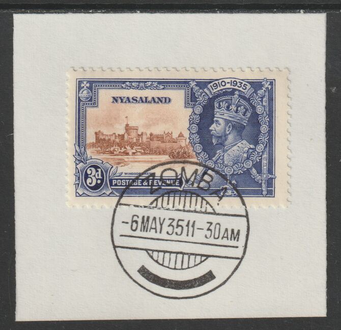 Nyasaland 1935 KG5 Silver Jubilee 3d (SG 125) on piece with full strike of Madame Joseph forged postmark type 314 (First day of issue), stamps on , stamps on  kg5 , stamps on silver jubilee, stamps on castles