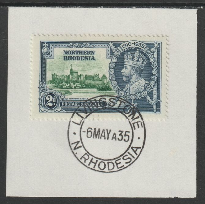 Northern Rhodesia 1935 KG5 Silver Jubilee 2d (SG 19) on piece with full strike of Madame Joseph forged postmark type 329 (First day of issue), stamps on , stamps on  stamps on , stamps on  stamps on  kg5 , stamps on  stamps on silver jubilee, stamps on  stamps on castles