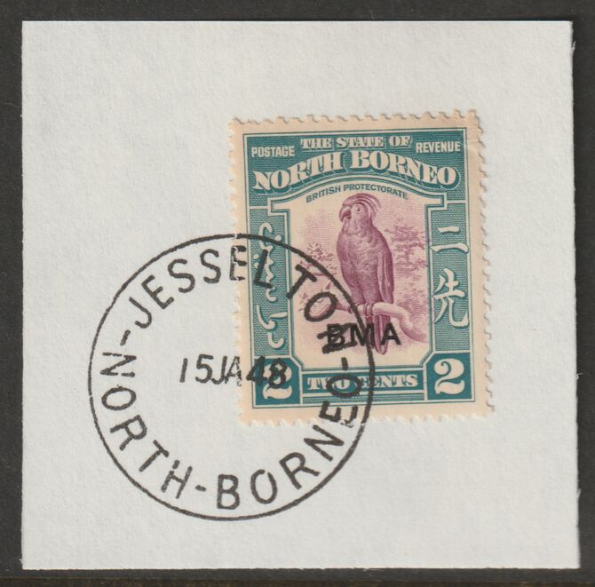 North Borneo 1945 BMA overprinted on 2c on piece with full strike of Madame Joseph forged postmark type 311, stamps on forgeries, stamps on  kg6 , stamps on birds, stamps on parrots