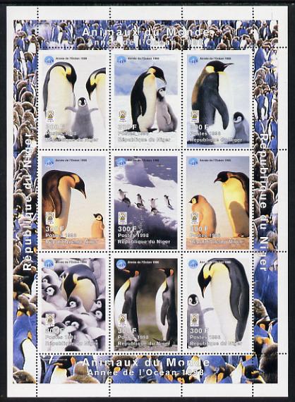 Niger Republic 1998 Animals of the World #5 (Penguins) perf sheetlet containing 9 x 300f values each with Year of the Ocean logo unmounted mint. Note this item is privately produced and is offered purely on its thematic appeal Scott #1010, stamps on , stamps on  stamps on animals, stamps on  stamps on birds, stamps on  stamps on penguins, stamps on  stamps on polar, stamps on  stamps on oceans